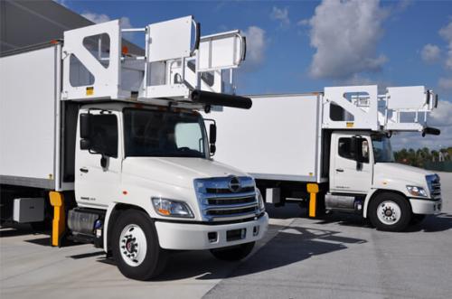 2 CL 80-20 CATERING HYDRAULIC LIFTS WITH REAR STAIRWAY, 4 WAY PORCH, RETRACTABLE HANDRAILS.